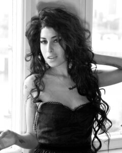 Amy Winehouse Instagram - In 2006, photographer Harry Benson captured Amy during her global success and recognition at the Savoy Hotel in London. The photographs beautifully highlight her lively and vibrant personality. 💗 #backtoblack
