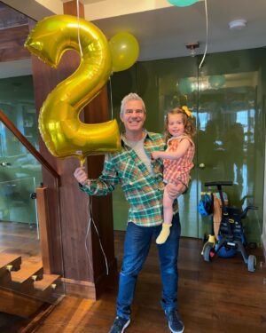 Andy Cohen Instagram - Lucy is Two! It is so exciting getting to know my daughter; she’s a smart, funny sweetheart who surprises me every day. And the female energy Lucy is shining all over this house is welcome and needed! It’s getting really fun over here!

Marking time through the filter of my children’s growth is blowing my mind at this later stage of my life. Everything feels on double-time but it’s also, as @hodakotb says, right on time. ♥️