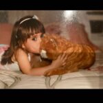 Angelina Pivarnick Instagram - I always loved cats. Look at baby me. This was taken in my grandmas bedroom in Staten Island. 🐱. She knew how later in life I would become the ultimate cat mama. #iloveyougrandma #prayingforyou