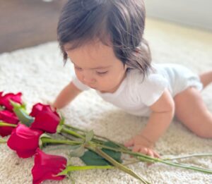 Anjelah Johnson-Reyes Instagram - My sweet angel baby. We can’t believe you’re 9 months old already! You’ve been on 13 flights. You are currently sleep training (again). You recognize your different family members on FaceTime by the things they do and say. You love your doggie brother Banzo. You gnaw on a chicken bone like a grown man and we love it! Happy 9 months #Rosieharlowreyes