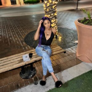 Ariane Nicole Andrew Instagram - When you step out all glammed up, feeling like a million bucks, ready to paint the town purple but then you raise your hand and think, “You know what, maybe a cozy night continuing reading your book collection is more the vibe.” 🤷🏽‍♀️