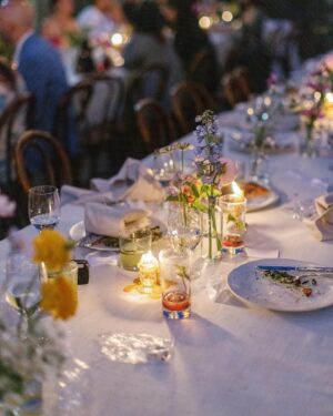 Arielle Vandenberg Instagram - I’ve always dreamed of having an intimate, backyard wedding! And two of our best friends, graciously offered their home! We wanted our wedding to be simple and sweet! And that’s exactly how it was! Bright and delicate flowers sprinkled across the tables. It definitely helped that the entire backyard had white roses in full bloom! (Gods gift saved us thousands of dollars lol). We had a deliciously unique cake that tasted of tres leches and apricot 🤤 (hands down favorite cake I’ve ever had). I’ve always wanted pizza at my wedding, so we hauled a 500 lbs pizza oven into the backyard for fresh amazing pizza! (Should have ate more that night, that’s for sure. 😂) Everyone took home Cutie cookies painted like our favorite girl, Stinky! Love was in the air as the fairy lights above our heads twinkled in the night sky and we danced the night away! ✨

Photos: @christinamcneill 
Video: @whiteinrevery 
Coordinator: @carlyraeweddings 
Dress: @chosenbykyha via @enblanc_la 
Veil: @amsale 
Glam: @afton 
Suit: @paulsmithdesign 
Catering: @madeinitalybistro 
Florals: @floretfloral 
Music: @rickyrocksdrums 
Cake: @kellygraycakes 
Cookies: @cubandcuppy 
Rentals: @lapinataparty 
Venue: @thejasonkennedy @thelaurenkennedy backyard 😍