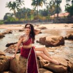 Ashi Singh Instagram - Red hot and ready to take on the ocean (or maybe just this rock for now). This dress is making waves 🌊(pun intended)! Photographer - @mirajverma_photography Makeup & Hair - @makeoverbysejalthakkar Outfit by - @jiya_fashion_designer Jewellery- @nihiraa_india X @purvabansal5 Team - @greenlight__media . . . #ashisingh #mermaidvibes #beachlife #reddress #fashiononthebeach #feelingbeautiful #oceanlove #dreamyescape #bollywood #fashion