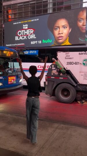 Ashleigh Murray Instagram - I’m breathing and deeply again. Now that our 118 day strike is over I can say that 58 days ago the project I’m most proud of, @theotherblackgirlhulu, released on Hulu. I’ve been a New Yorker for 15 years, an actress for 25, and a dreamer all my life. I’ve been dying to share how impactful this job has been, but gonna start with this. Just me screaming in Times Square. 

@lindseyfaig 🩷