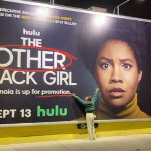 Ashleigh Murray Instagram - We were just strolling along at 10p and found a massive, massive wall with my face on it 😭 

@theotherblackgirlhulu is still available to stream right now!