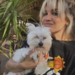 Ashley Roberts Instagram - We had to say good bye to our little Cooper this week. He almost made it to his 16th birthday. He traveled all over with me. Loved getting in his bag knowing an adventure awaited. Let me dress him up in ridiculous outfits. Even had his own episode on a tv show I filmed years back. What a legend. After he got attacked at a park he spent the last few years in AZ with my mom. Where she nurtured him and took such good care of the lil guy. So much joy he brought to so many. Rest in peace lil Coop. Love you buddy. Best buddy in the world 🐾