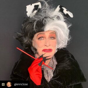 Bette Midler Instagram - FABULOUS!!!! Muah!  #Repost with @Repostlyapp @glennclose Suiting up for BETTE MIDLER’S virtual HOCUS HALLOWEEN fundraiser for her remarkable NEW YORK RESTORATION PROJECT. I’ll be sure to post an invitation when I can. These pictures and video were shot by Seonaid “Sho” Campbell. 

HOMEMADE CRUELLA: 
Chopstick painted red = cigarette holder. 
Wig—online
Red gloves with black nails = black gloves with nails under red gloves with cut off tips
Leopard scarf=silk long Johns
Dalmatian puppy ears= local Halloween store
Coat = wardrobe from my movie The Wife
Makeup: Didn’t have a really pale base so I tried baby powder. Looks weird on the side of my face. Not a rousing success. Also needed a liquid eyeliner...next time.