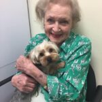 Betty White Instagram - It’s a rainy Monday in LA so here’s a sunny smile to brighten the day :). Any time we went to appointments or meetings, we tried to have a dog or cat available for Betty to love on.