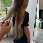 Beverley Mitchell Instagram - Today was going to be a big day! We went to get Hutton a hair cut! @iamkenzielynne got a big trim and then…. He couldn’t do it. So we cut off 4 inches and it looks more like a trim. #longhairdontcare #goodhair #blonde Can we just talk about how beautiful their hair is???? I mean Hutton’s color is everything!