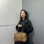 Bona Instagram - Celebrating the new @prada Re-Nylon Bag🤎 #PradaReNylon #adv