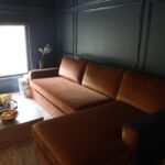 Caity Lotz Instagram - I’m so in love with this rust sleeper sectional from @interiordefine ! We got to customize the size, color, and cushions to get exactly what we needed for the room. We wanted a movie room/den, but also needed a place for guest so this sleeper sofa was the perfect solution. The coffee table is from @thehavenly and the leather chair also from @interiordefine #defineby @theinside Promo code: CAITY20