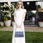 Cara Buono Instagram - A beautiful summer night honoring the wonderful, talented and inspiring @metier.london founder, @melissa.metier. #summer #soiré #garden #instagood #ny #hamptons #fashion Bag @metier.london Dress @roland_mouret Shoes @larroude Jewelry @pamelalove Earrings @monbouquettejewelry Sunglasses @garrettleight Styled by @bailey.moon HMU by me @voguemagazine