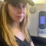 Cara Buono Instagram - Plane selfies. Been a while. Dark circles and top knot. #plane #travel #switzerland #zurich #instagood #basel #topknot #strangerthings