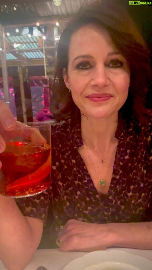 Carla Gugino Instagram - So Peeps! My personal Negroni of choice (in the world!) is the one that magically springs from I Sodi and Via Carota in #NYC. Why it’s SO perfect, I can’t tell you. The beautiful culinary masterminds Rita Sodi and Jody Williams’ beloved restaurants just have that intangible quality that makes the whole experience perfect. They have created a true haven in the West Village that has enriched many of our lives over the years (including through the thick of Covid.) I believe in them, and the way they do business with such integrity, that I was compelled to invest in their dream! People come from far and wide to experience their rare brand of simple exquisite home-y Italian warmth. I am so thrilled that their cocktails (Negroni is one of them-whew!) will be direct to consumer starting TODAY. I have seen (mixologist) Chris Cardone master these over the years to bring us the perfect version of each cocktail. 👏🏼🔥 You can find out more at @drinkviacarota