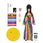 Cassandra Peterson Instagram - NECA is celebrating Pride Month early with a brand new Elvira action figure, this one a variant dubbed “Over the Rainbow Elvira.” And it’s been released this week for a great cause. NECA previews, “The devilishly delightful Cassandra Peterson has played the part of Elvira for more than 40 years with grace, humor and more than a little camp. NECA is proud to present this “Over the Rainbow” Elvira figure, celebrating the horror and queer icon in a never-before-seen, sparkling rainbow dress for your collection. “To spread the love, when you place an order for the Over the Rainbow Elvira on THENECASTORE.COM, you’ll receive free shipping! We’ve also joined with Cassandra to support equality for all. NECA and Elvira are proud donors to the Human Rights Campaign, which strives to end discrimination against LGBTQ people. “With an original tailored fabric gown, glittery ruby red heels, and a yellow brick display base, she’s definitely not in Kansas anymore! This fully articulated 8-inch action figure features new faceplate technology with two interchangeable expressions and hands, including brand new ones that allow you to recreate Elvira’s signature pose! She comes with a book accessory of Peterson’s memoir, Yours Cruelly, Elvira, and a double-sided flag with 10 stickers to customize and show your unique pride! Collector-friendly window box packaging.” The best part? $10 from every purchase will benefit the Human Rights Campaign, which is the largest LGBTQ political lobbying organization within the United States.
