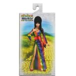 Cassandra Peterson Instagram - ANNOUNCEMENT! 🏳️‍🌈 🖤 ➖ Elvira - Over the Rainbow Elvira 8” Clothed Figure ➖ Celebrate Pride Month with Elvira, Mistress of the Dark! The devilishly delightful Cassandra Peterson has played the part of Elvira for more than 40 years with grace, humor and more than a little camp. NECA is proud to present this “Over the Rainbow” Elvira figure, celebrating the horror and queer icon in a never-before-seen, sparkling rainbow dress for your collection. With an original tailored fabric gown, glittery ruby red heels, and a yellow brick display base, she’s definitely not in Kansas anymore! This fully articulated 8-inch action figure features new faceplate technology with two interchangeable expressions and hands, including brand new ones that allow you to recreate Elvira’s signature pose! She comes with a book accessory of Peterson’s memoir, “Yours Cruelly, Elvira”, and a double-sided flag with 10 stickers to customize and show your unique pride!  ➖ Available now on thenecastore.com, and shipping to your favorite NECA retailer in June! ➖ #Elvira #MistressoftheDark #Pride #OvertheRainbow #CassandraPeterson #NECA #actionfigure