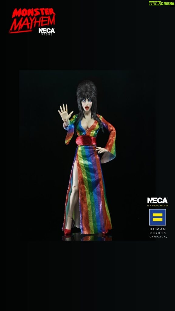 Cassandra Peterson Instagram - 🌈Elvira - Over the Rainbow Elvira 8” Clothed Figure is DROPPING on the NECA Store at 12pm ET! 🏳️‍🌈 🖤 Link in bio. ➖ Celebrate Pride Month with Elvira, Mistress of the Dark! The devilishly delightful Cassandra Peterson has played the part of Elvira for more than 40 years with grace, humor and more than a little camp. NECA is proud to present this “Over the Rainbow” Elvira figure, celebrating the horror and queer icon in a never-before-seen, sparkling rainbow dress for your collection. To spread the love, when you place an order for the Over the Rainbow Elvira on THENECASTORE.COM, you’ll receive free shipping! We’ve also joined with Cassandra to support equality for all. NECA and Elvira are proud donors to the Human Rights Campaign, which strives to end discrimination against LGBTQ people. With an original tailored fabric gown, glittery ruby red heels, and a yellow brick display base, she’s definitely not in Kansas anymore! This fully articulated 8-inch action figure features new faceplate technology with two interchangeable expressions and hands, including brand new ones that allow you to recreate Elvira’s signature pose! She comes with a book accessory of Peterson’s memoir, Yours Cruelly, Elvira, and a double-sided flag with 10 stickers to customize and show your unique pride! Collector-friendly window box packaging.  ➖ In-Stock now! ➖ 🌈Free shipping only applies to the Elvira - Over the Rainbow Elvira 8” Clothed Figure. 🌈A limited number come with an autograph card signed by Elvira herself! ✍️🖤 ➖ #MonsterMAYhem #Elvira #MistressoftheDark #Pride #OvertheRainbow #CassandraPeterson #NECA #NECAStore #actionfigure