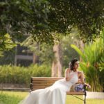 Chaithania Prakash Instagram - 🕊🤍 Airbrush makeup done with Christian gown for @briella.in Amazing gown : @briella.in Bouquet : @briellaflorals Photography : @sharon.shyam @storiesbysharonshyam Makeup & hairstyle : @soumyashyam_makeupartist Location : Whispering water resort Reels : @jeeva_balakrishnan @sumin_s_kumar Thanks : @shinil__vinod