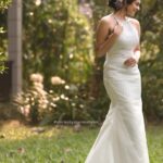 Chaithania Prakash Instagram - 🕊🤍 Airbrush makeup done with Christian gown for @briella.in Amazing gown : @briella.in Bouquet : @briellaflorals Photography : @sharon.shyam @storiesbysharonshyam Makeup & hairstyle : @soumyashyam_makeupartist Location : Whispering water resort Reels : @jeeva_balakrishnan @sumin_s_kumar Thanks : @shinil__vinod