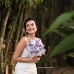 Chaithania Prakash Instagram - 🕊🤍 Airbrush makeup done with Christian gown for @briella.in Amazing gown : @briella.in Bouquet : @briellaflorals Photography : @sharon.shyam @storiesbysharonshyam Makeup & hairstyle : @soumyashyam_makeupartist Location : whispering water resort Reels : @jeeva_balakrishnan @sumin_s_kumar Thanks : @shinil__vinod
