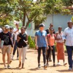Charlize Theron Instagram - Throwback to 2018 CTAOP visit to @agahozoshalom in Rwanda. I love when memories like this pop up. EVERY young person has the right to health and safety. Our work @CTAOP supporting youth in Southern Africa and advocating for the Sustainable Development Goals serves as a constant reminder how critical it is to stand together with communities and community leaders to effect change. #GlobalGoals