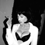 Charlotte McKinney Instagram - Halloween budget tip..just get yourself an 8$ bad black wig from Amazon and a real bloody nose and there ya have it Mia Wallace 👻🩸🩸🩸