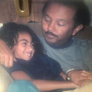 Chelsea Tavares Instagram - It’s been a month since My dad has passed. we were all nervous about posting it, because it makes it a bit more real , now that it’s public. A Post will never hold enough weight to let people know how much you impacted us and others around us. From our family, to friends, to neighbors, to the people that worked at your favorite donut shop. you were the person that loved and people called on. You were the Father to people that didn’t have a father . when our friends and ex’s fly out of state just to see you one more time before you go, you know you’re the shit. No matter what happened in life, you were always there. Always on time to pick us up from school, or the airport. You were the cook of the house. we were the house, where you knew my dad was gonna grill and make some bomb burgers or steak while mommy drank her white wine and cleaned.  you quietly sized up all of me and my sisters dates.. You would leave Hershey chocolate bars on our pillows in the morning every valentine’s day. Even when mommy was mad, you grabbed her , kissed her, and would squeeze her butt until she laughed. when i think of GOOD CLASSIC music. like that bobby Caldwell , Phil collins, The Beatles, Debarge music. I think of you. The Police was our favorite band. we would play it driving down to San diego. we shared our love for vintage cars and black and white movies.  you made me Look up all of the black actresses & singers that i didn’t know about from the 40’s and 50’s.  Koden keeps asking for “pop pop”. it’s really hard to answer him. you said watching a movie and having a bowl of Vanilla ice cream with him , was you and koden’s “thing”. so I will continue to remind him of that. he had a bowl the other day ♥️ Currently wearing your T shirt and the bracelet you got me for my 30th.  It’s so surreal. I wish I could hug you, i wish you would call me saying “i don’t want nothing, just want to tell you I love you.” There is always gonna be a hole in my heart. I wish you could have walked us down the aisle, but i believe we have too much character and personality for the spirit to just not be here any more. i can literally feel you around. we just miss you. that’s all. ♥️your “Chelsea Baby”