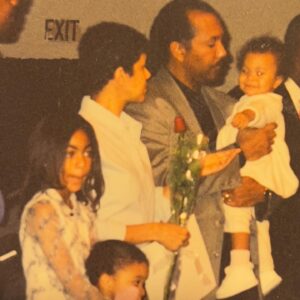 Chelsea Tavares Instagram - It’s been a month since My dad has passed. we were all nervous about posting it, because it makes it a bit more real , now that it’s public. A Post will never hold enough weight to let people know how much you impacted us and others around us. From our family, to friends, to neighbors, to the people that worked at your favorite donut shop. you were the person that loved and people called on. You were the Father to people that didn’t have a father . when our friends and ex’s fly out of state just to see you one more time before you go, you know you’re the shit. No matter what happened in life, you were always there. Always on time to pick us up from school, or the airport. You were the cook of the house. we were the house, where you knew my dad was gonna grill and make some bomb burgers or steak while mommy drank her white wine and cleaned.  you quietly sized up all of me and my sisters dates.. You would leave Hershey chocolate bars on our pillows in the morning every valentine’s day. Even when mommy was mad, you grabbed her , kissed her, and would squeeze her butt until she laughed. when i think of GOOD CLASSIC music. like that bobby Caldwell , Phil collins, The Beatles, Debarge music. I think of you. The Police was our favorite band. we would play it driving down to San diego. we shared our love for vintage cars and black and white movies.  you made me Look up all of the black actresses & singers that i didn’t know about from the 40’s and 50’s.  Koden keeps asking for “pop pop”. it’s really hard to answer him. you said watching a movie and having a bowl of Vanilla ice cream with him , was you and koden’s “thing”. so I will continue to remind him of that. he had a bowl the other day ♥️ Currently wearing your T shirt and the bracelet you got me for my 30th.  It’s so surreal. I wish I could hug you, i wish you would call me saying “i don’t want nothing, just want to tell you I love you.” There is always gonna be a hole in my heart. I wish you could have walked us down the aisle, but i believe we have too much character and personality for the spirit to just not be here any more. i can literally feel you around. we just miss you. that’s all. ♥️your “Chelsea Baby”