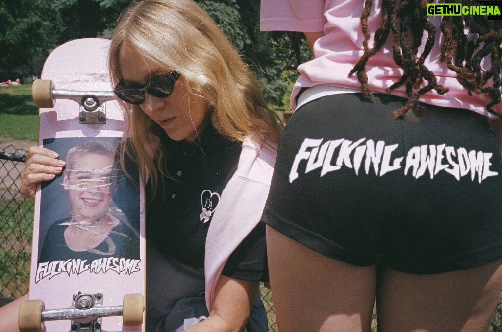 Chloë Sevigny Instagram - September 6th get your @fuckingawesome booty shorts, polos and more, designed by moi! For boys and girls and everyone in between. Classic class photo board with new pink glitter background too! 🖤F🎀A🖤