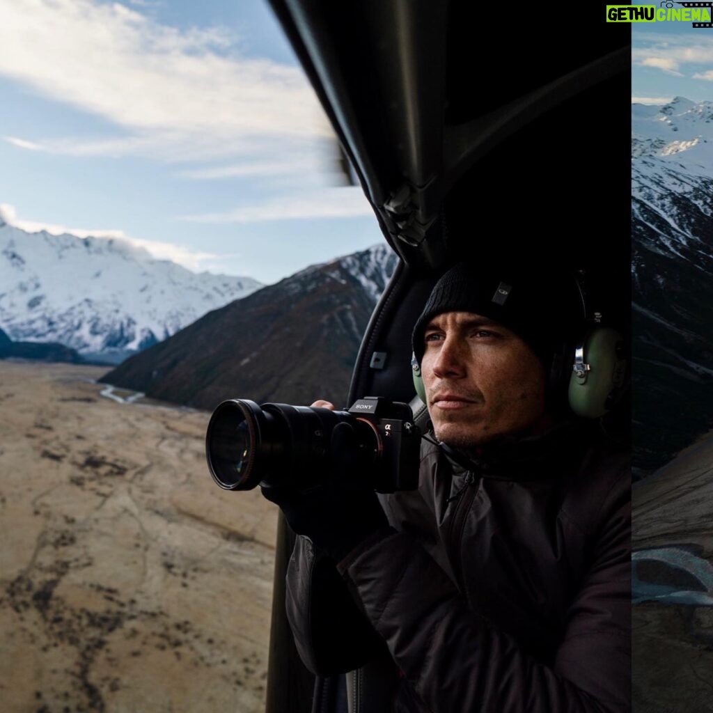 Chris Burkard Instagram - From my expression in the first image you’d think I hate flying but in all reality it’s where I’m happiest... especially if if the doors’ open with an expansive view and cold wind in my face. Here’s a series of some favorites shot in New Zealand during an assignment for Icebreaker in 2018, documenting Mt. Cook and it’s beautiful surrounding valleys. A landscape that encourages time spent away from man-made structures and preferably among blue glaciers & vast mountain ranges