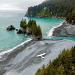 Chris Burkard Instagram - Alaska, 2020 on assignment for @billabong just before the pandemic We had taken a boat to a rivermouth in search for a wedge I’d heard about breaking near the rock formations. After some fruitful waves, I put up a drone to capture a more expansive angle and to my surprise, we found a bush plane parked on the beach. Evidently, that little stretch of coastline served as a runway for the inhabitants of the little cabin just overlooking the shores. It really struck me in that moment how off the grid people really live... the only way you can access is by firing up a cessna, crossing a river via kayak, and going home to a little home that you built with your own hands. Alaska is still a frontier in so many ways... one of those places that’ll change you every time you visit