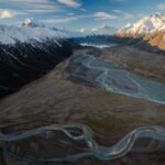 Chris Burkard Instagram - From my expression in the first image you’d think I hate flying but in all reality it’s where I’m happiest... especially if if the doors’ open with an expansive view and cold wind in my face. Here’s a series of some favorites shot in New Zealand during an assignment for Icebreaker in 2018, documenting Mt. Cook and it’s beautiful surrounding valleys. A landscape that encourages time spent away from man-made structures and preferably among blue glaciers & vast mountain ranges