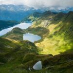 Chris Burkard Instagram - It’s wild to consider the amount of life these mountains have witnessed throughout different chapters in the history of the world... Hannibal leading the Carthaginian army across the alps in 218 BC to the development of alpinism and years of brave people ticking off first ascents with only rudimentary gear and a strong will. Every time I set foot in them.. it invites a way of life that encourages constant awareness without distraction. You have to pay attention to your surroundings but you also feel at peace with that rhythm of life - something I find harder to achieve surrounded by man made structures. These images come from 2016 on a perfect day in the Swiss alps.. gazing down at Lake Ritom with a bit of disbelief at our luck finding a glassy lake with a backdrop more like a painting than reality…