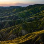 Chris Burkard Instagram - California’s Carrizo Plains & Cuyama Valley provide little access even with a good 4x4 vehicle for those hoping to photograph the surrounding ridges… while planning this particular assignment, we felt that flying in an Lightweight Aerial Trike and a Cessna seemed the best way to capture the dramatic effects of the super bloom in a way that gave genuine context to the landscape… something I value when putting together a body of work. Throughout my career, @natgeo has always been an incredible example of showcasing the earth and the important stories that it has to share… so this assignment to document California’s super bloom following significant winter rainfall in 2023 felt a little extra special being so close to my home.