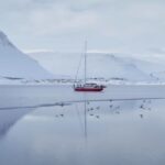 Chris Burkard Instagram - Surfing under the northern lights wasn’t really on my radar for several years & trips to Iceland - but in 2015 it was a late winter night in the north between storms… when an exceptional swell came in during an expedition and the possibility of the Aurora being a backdrop to surfing dawned on me… the conditions lined up and I realized we couldn’t let this window pass - a special culmination of remote beauty found in the northern hemisphere and a sport I dedicated my life to…. And with a little extra coaxing, my friends @timmymissions @hammered_sam & @jquinny got out of bed & put the wetsuits on after a long day of surfing and paddled back out… making one of the greatest memories of my career, and would eventually became my film Under an Arctic Sky. You can watch the whole film at the link in my profile