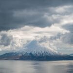 Chris Burkard Instagram - Stretching between the shores of Alaska and Russia, this chain of 14 volcanoes and 55 smaller land masses make up what is known as the Aleutian Islands… one of the most remote and difficult landscapes I’ve photographed - due to the harsh storms the frequent the Bering sea that often shrouds them in thick clouds & fog. In the past, I had set out to these islands with the goal of surfing in mind.. but in 2018, I received a grant from Conservation International to document the Alaska Maritime Wildlife Refuge - focusing more on showing the scope of the landscape and it’s largely undisturbed beauty. We caught a window in the weather - so I grabbed my camera & jumped in a small plane… resulting in some of the most unforgettable aerial views of my career.