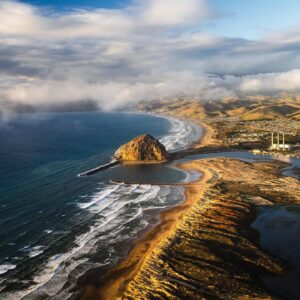 Chris Burkard Instagram - Over the last week, I’ve been filming First Take: Season 2 around my old stomping grounds here in California’s Central Coast... I felt like it’s important to show places that are sometimes overlooked for visiting, especially one that played such a huge part in my career back in the days when I lived in my truck and was borrowing telephoto lenses to shoot surf. Since aerial photography is a passion of mine, I decided to share that perspective with @rachel_jones_ross and we scored one of the best sunsets I’ve seen in years, serving as a reminder of how special & idyllic this little corner of the world can be.