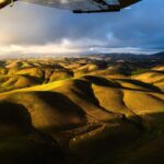 Chris Burkard Instagram - Over the last week, I’ve been filming First Take: Season 2 around my old stomping grounds here in California’s Central Coast... I felt like it’s important to show places that are sometimes overlooked for visiting, especially one that played such a huge part in my career back in the days when I lived in my truck and was borrowing telephoto lenses to shoot surf. Since aerial photography is a passion of mine, I decided to share that perspective with @rachel_jones_ross and we scored one of the best sunsets I’ve seen in years, serving as a reminder of how special & idyllic this little corner of the world can be.