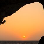 Chris Burkard Instagram - Whether you’re in the deserts of Saudi Arabia deep in a snowy fjord in Iceland, or in this case climbing on the shores of Mallorca… sunsets with colors like these tend to make you stop in your tracks and pause. That moment, when we let go of focus, stress even in our current surroundings and spend time in awe of the natural beauty marking the end of the day is a point of unity in my mind. As humans, no matter our background - we can all agree that at one point or another, the magic of the natural world & sunsets captivated our attention for a short moment of bliss marking the end of a day…. and the beginning of a new one for those on the other side of the planet. I’ve been lucky to see many of them in my life & work… this image is from a particularly beautiful night shooting @ethan_pringle deep water soloing for @sonyalpha in Mallorca, 2021