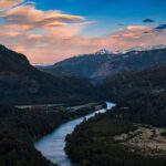 Chris Burkard Instagram - The canyon shown above is home to the Rio Palena - a powerful river system teeming with salmon and trout that eventually feeds into the South Pacific traveling through 150 miles of striking landscapes. This particular night, i noticed a storm rolling in close to the @elevenexperience lodge and decided to put the drone up (despite significant wind) to capture the sunset and idyllic lenticular clouds that are commonly seen in Patagonia, brushed by wind swirling at high speeds. During this assignment, I also had the opportunity to spend a lot of time flying with @aeroalerce - affording me a more in depth intake of the landscape but still just an introduction into over 2,300 islands that sit off the coast of Chile and over 800 fjords. It’s still a little hard to process the sheer amount of landscape here and I’m excited to continue to explore it