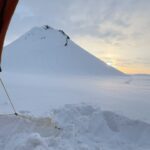 Chris Burkard Instagram - I’m still unraveling the experience we had ski traversing through Icelands interior last month … expeditions no matter how big or small always allow you to reflect internally and draw close to those around you. In this case me and my 3 tent mates definitely shared some pretty special moments… this was for sure one of them. Waking up with the sun on Mælifelsandur right in front of the famous mountain. Eating breakfast with puffy eyes and cold hands.. these are life’s most precious moments. @helsport