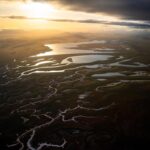 Chris Burkard Instagram - California’s Carrizo Plains & Cuyama Valley provide little access even with a good 4x4 vehicle for those hoping to photograph the surrounding ridges… while planning this particular assignment, we felt that flying in an Lightweight Aerial Trike and a Cessna seemed the best way to capture the dramatic effects of the super bloom in a way that gave genuine context to the landscape… something I value when putting together a body of work. Throughout my career, @natgeo has always been an incredible example of showcasing the earth and the important stories that it has to share… so this assignment to document California’s super bloom following significant winter rainfall in 2023 felt a little extra special being so close to my home.
