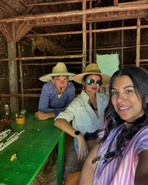 Chrissie Fit Instagram - Who would’ve pegged me as a guajira? Los paisajes de Cuba son una maravilla. The Cuban countryside is unreal. I recommend you go there and buy tobacco directly from the farmers. They are forced to give 90% of their crops to the government and only have 10% to sell themselves. It’s more authentic this way and you’re helping the farmer, who takes so much pride in growing their tobacco, fruits, veggies, and coffee. Btw, I did not know how to smoke a cigar. At the risk of losing my Cuban card, I will post in my stories 😅

#Cuba #Vinales #CuevaDelIndio #palenquedeloscimarrones #cubancountryside #ReturnToMyRoots #CubanHeritage #Cuban #Guajiro #Guajira