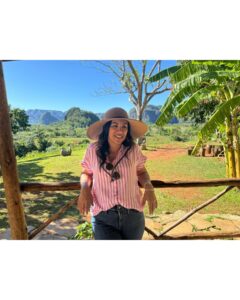 Chrissie Fit Instagram - Who would’ve pegged me as a guajira? Los paisajes de Cuba son una maravilla. The Cuban countryside is unreal. I recommend you go there and buy tobacco directly from the farmers. They are forced to give 90% of their crops to the government and only have 10% to sell themselves. It’s more authentic this way and you’re helping the farmer, who takes so much pride in growing their tobacco, fruits, veggies, and coffee. Btw, I did not know how to smoke a cigar. At the risk of losing my Cuban card, I will post in my stories 😅 #Cuba #Vinales #CuevaDelIndio #palenquedeloscimarrones #cubancountryside #ReturnToMyRoots #CubanHeritage #Cuban #Guajiro #Guajira