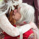 Christina Hendricks Instagram - My mother has Alzheimer’s and was not able to come to New Orleans for our wedding, so we brought the wedding to her yesterday in our backyard. My mother has always been my best friend and there was no way we weren’t going to share our love and celebrate with the biggest supporter and cheerleader in my life. When you are living so in the moment, so in the present, it is so important to have beauty and love and happiness around you. This time we had flower girls and dogs and more wonderful friends join us. @garbage surprised us with a Scottish wedding twist to this ceremony and it was another perfect day. @gillyflowersla made beautiful arrangements inspired by our New Orleans wedding and who wouldn’t want to wear their wedding dress twice!!! @katyakatyalondon @clairepettibone #alzheimers