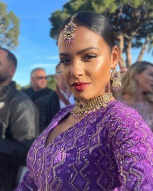 Christina Milian Instagram - Splashes of color & love in Côte d’Azur 💒💜✨ 
When the wedding invitation says ‘Colorful, Elegant Indian Attire’ you dress the part & even better we experienced the culture! Such a beautiful parade down the isle with the groom. #WeUnderstoodTheAssignment 🥳 
Congrats Again to the Kamani’s! Had a blast.

Outfit: @indianfashionsparis