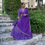 Christina Milian Instagram - Splashes of color & love in Côte d’Azur 💒💜✨ When the wedding invitation says ‘Colorful, Elegant Indian Attire’ you dress the part & even better we experienced the culture! Such a beautiful parade down the isle with the groom. #WeUnderstoodTheAssignment 🥳 Congrats Again to the Kamani’s! Had a blast. Outfit: @indianfashionsparis