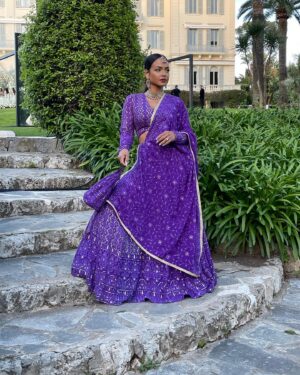 Christina Milian Instagram - Splashes of color & love in Côte d’Azur 💒💜✨ 
When the wedding invitation says ‘Colorful, Elegant Indian Attire’ you dress the part & even better we experienced the culture! Such a beautiful parade down the isle with the groom. #WeUnderstoodTheAssignment 🥳 
Congrats Again to the Kamani’s! Had a blast.

Outfit: @indianfashionsparis