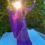 Christina Milian Instagram - Splashes of color & love in Côte d’Azur 💒💜✨ When the wedding invitation says ‘Colorful, Elegant Indian Attire’ you dress the part & even better we experienced the culture! Such a beautiful parade down the isle with the groom. #WeUnderstoodTheAssignment 🥳 Congrats Again to the Kamani’s! Had a blast. Outfit: @indianfashionsparis