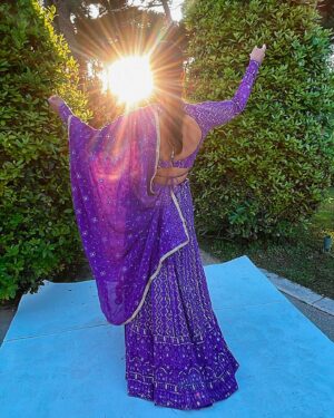 Christina Milian Instagram - Splashes of color & love in Côte d’Azur 💒💜✨ 
When the wedding invitation says ‘Colorful, Elegant Indian Attire’ you dress the part & even better we experienced the culture! Such a beautiful parade down the isle with the groom. #WeUnderstoodTheAssignment 🥳 
Congrats Again to the Kamani’s! Had a blast.

Outfit: @indianfashionsparis